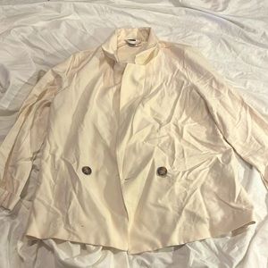 Cream colored formal jacket. Never worn. No holes, tears, or stains.
